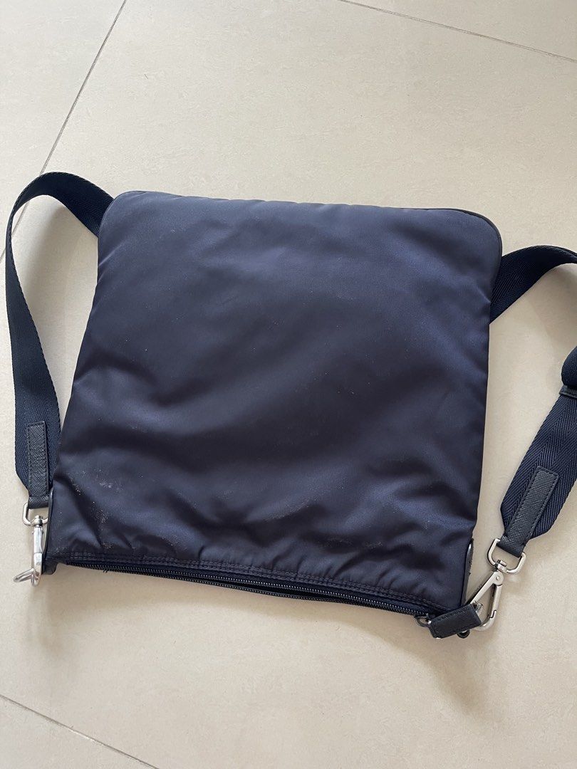 Authentic Prada Nylon Crossbody Bag Navy Blue (Category: Luxury Bags & Wallets) located in Taguig. Submitted by supplementary (Listing ID 1444746323, Image 2). Description: - Authentic Prada crossbody bag Flaws in the picture.