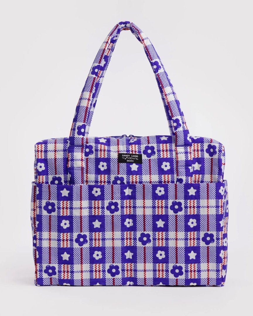 BAGGU x Sandy Liang Cloud Carry-On (Category: Tote Bags) located in Pasig City. Submitted by evrylabel (Listing ID 1444715709, Image 1). Description: Definitely one of the most sought after collabs. 🤍 MOP: Gcash/UB/EW Shipping: J&T/GoGo/Grab/Lalamove CLOUD CARRY-ON Our Cloud Carry-On is the bag to help you float away for a weekend… and maybe then some. It fits everything you need for a weekend away, happily rides on your roll-aboard, stuffs easi