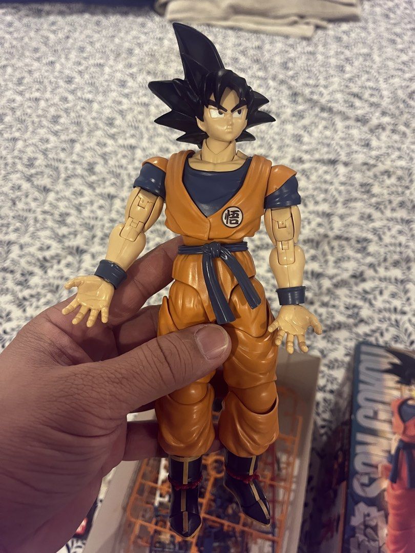 Bandai Figure-rise Standard Dragon Ball Z Son Goku Model Kit (Category: Figurines & Statues) located in Antipolo. Submitted by ninofranco (Listing ID 1444808556, Image 2). Description: - Bandai Figure-rise Standard Son Goku model kit - Original 2009 release - All parts still on sprues and sealed - Includes all original accessories and instructions - Box has minor shelf wear, good overall condition - Perfect for Dragon Ball Z fans!.