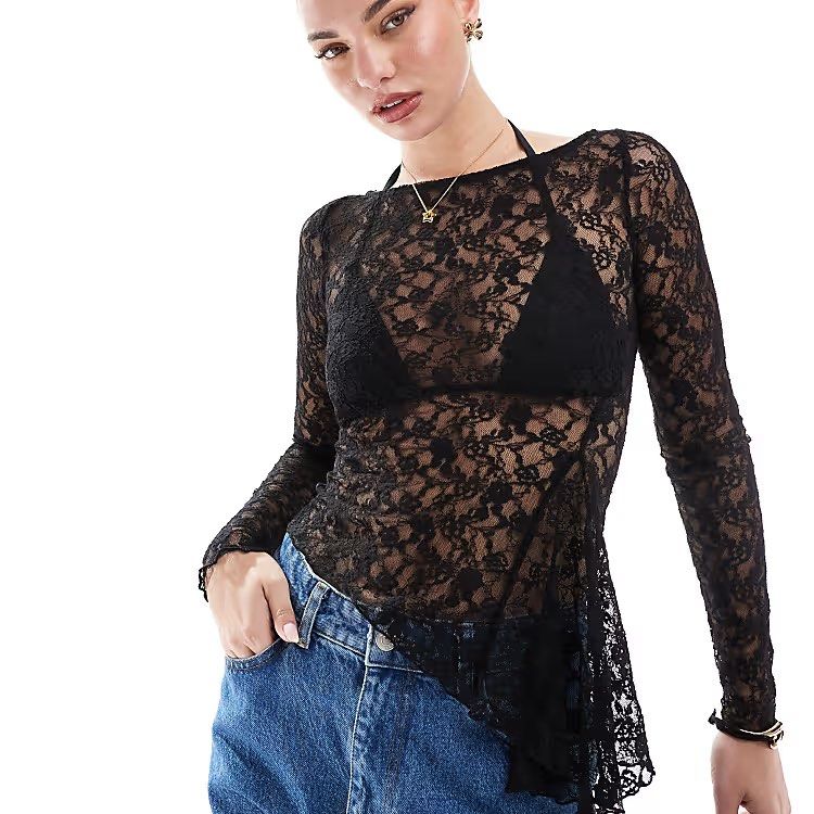 Bershka asymmetric black lace top (Category: Blouses) located in Taguig. Submitted by cheks07 (Listing ID 1444784752, Image 3). Description: Bershka black lace top (NO INNER) Asymmetrical hem Can fit medium, large No asking for measurements and When Worn photos please❣️❣️❣️❣️.