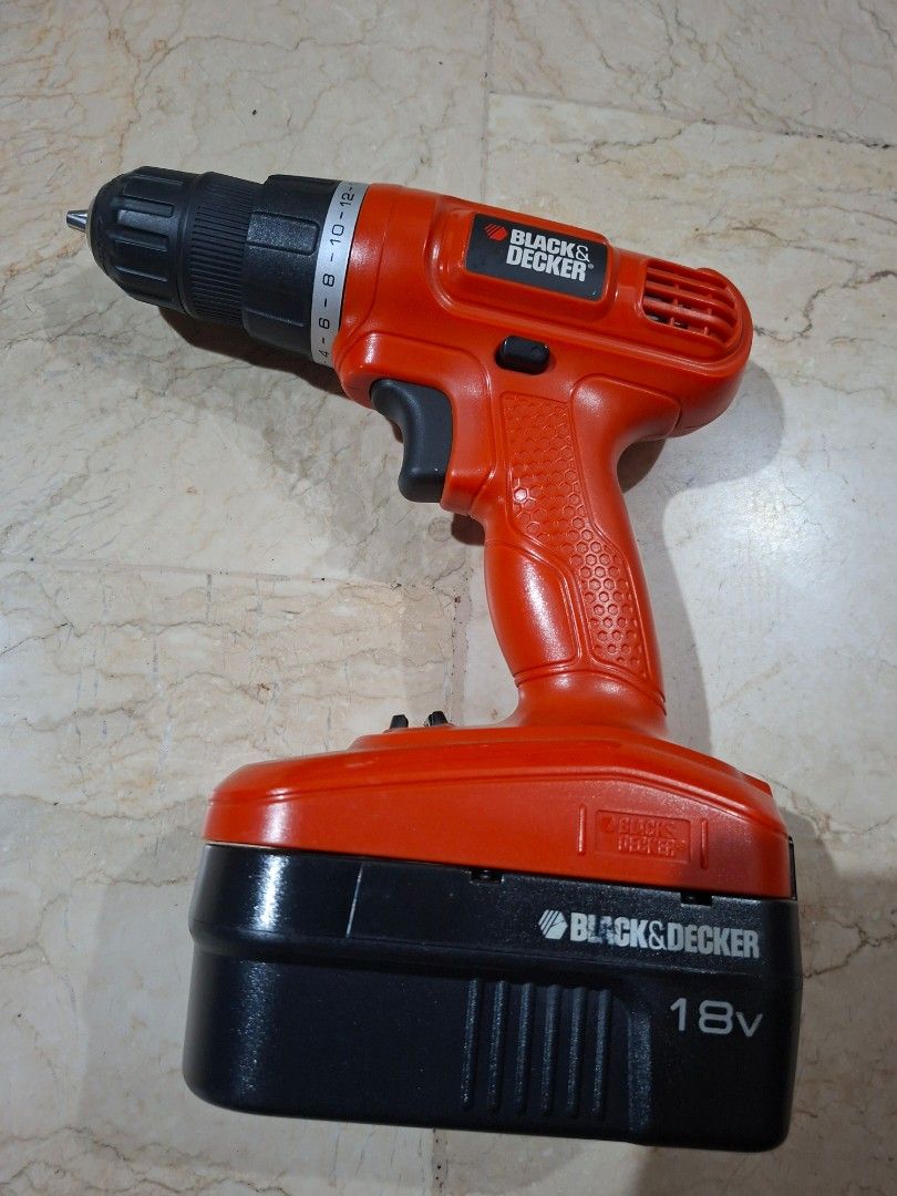 Black & Decker 18V Cordless Drill (Category: Construction Tools & Equipment) located in Manila. Submitted by d_of_olx (Listing ID 1444754318, Image 2). Description: - Black & Decker 18V Cordless Drill - Color: Orange and Black - Condition: Works well - Includes: Battery - Ideal for: Home projects - Made in USA.
