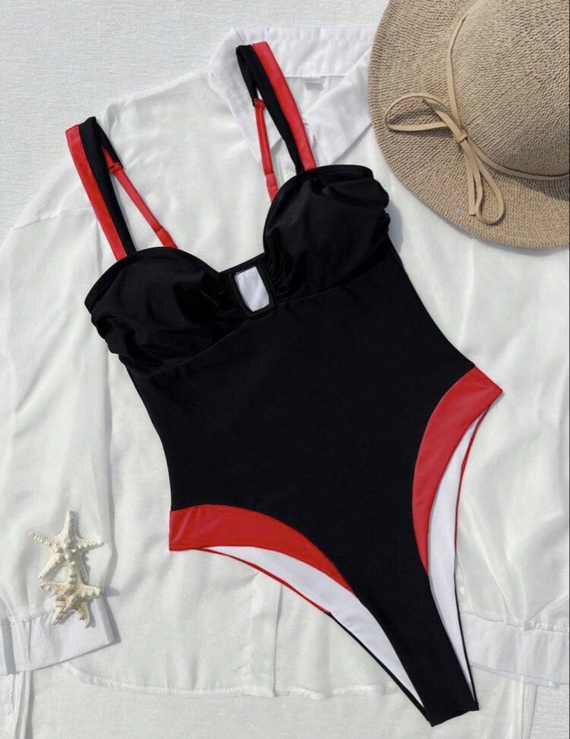 Black & Red High-Cut One-Piece Swimsuit (Category: Bikinis & Swimsuits) located in Taguig. Submitted by _lovedpieces (Listing ID 1444823811, Image 3). Description: - Classic black one-piece swimsuit - Eye-catching red trim - Flattering high-cut leg design - Adjustable straps for a perfect fit - Bust: 26.4 in - Waist: 22.8 in - Hip: 27.2 in - Length: 22 in - Ideal for beach or pool outings.