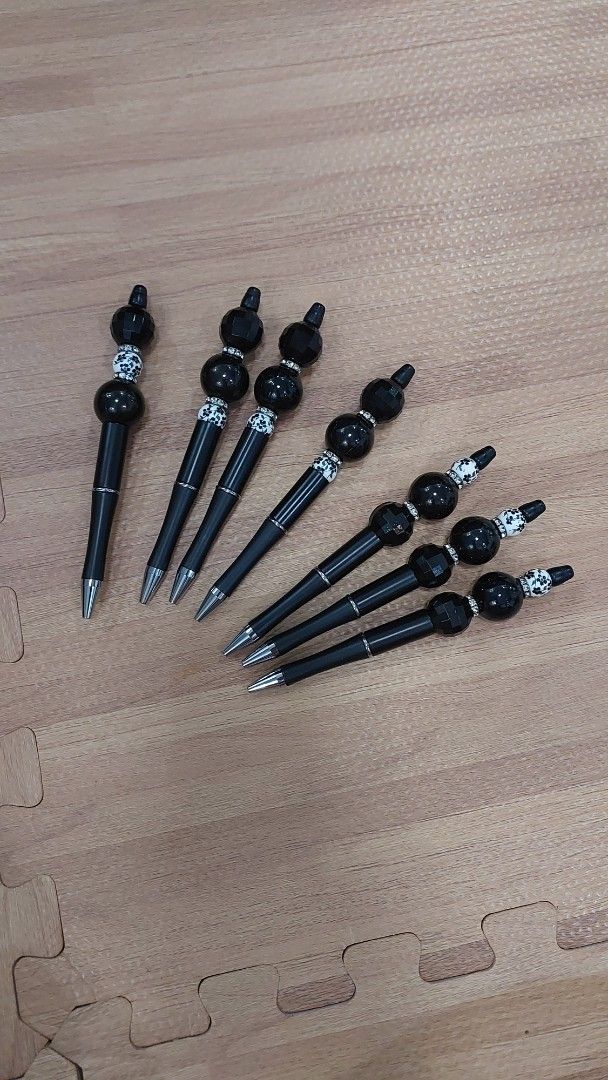 Black Beaded Pens & Colorful Beaded Pens (Category: Craft Supplies & Tools) located in Cainta. Submitted by zealbear.17c9b2 (Listing ID 1444680365, Image 1). Description: - black pens with decorative beads. - colorful pens with various unique bead designs. - Ideal for journaling, crafting, or everyday writing. - Unique designs not commonly found. - All pens are in good working condition. - Handmade.