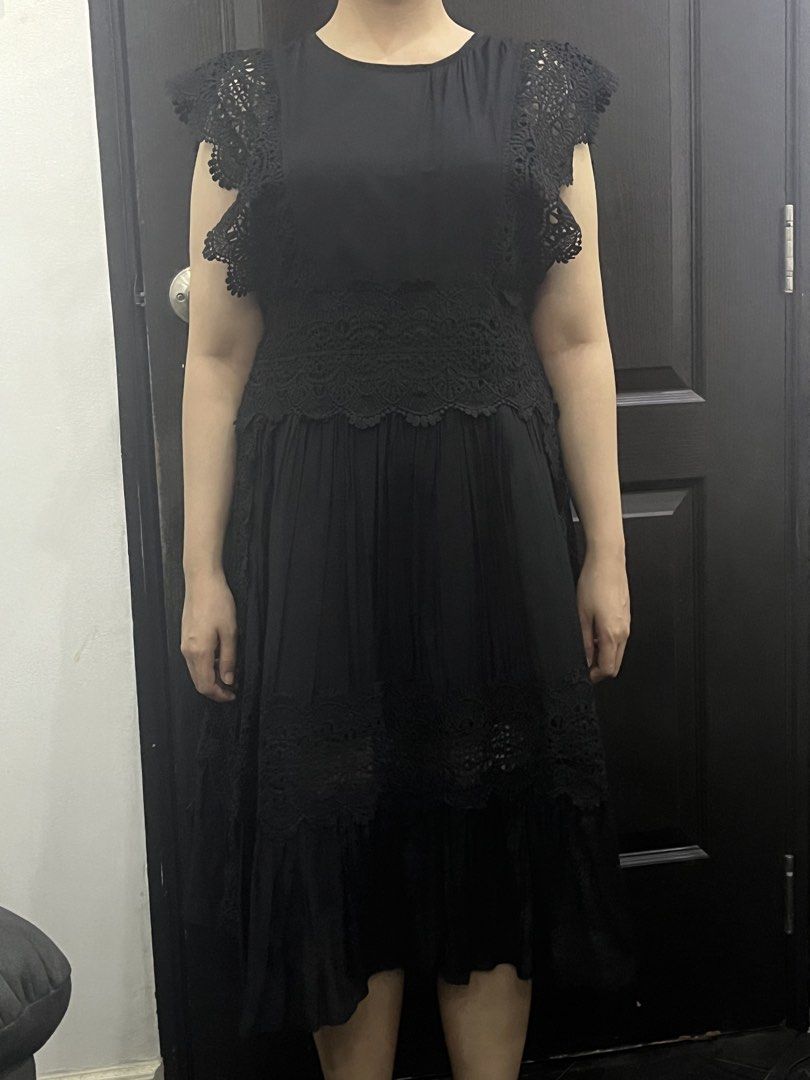 Black Lace Trimmed Midi Dress (Category: Dresses) located in Manila. Submitted by hello88panda88 (Listing ID 1444827129, Image 2). Description: - Chic black midi dress - Delicate lace detailing on flutter sleeves and waist - Flattering tiered skirt with lace trim - Convenient back zipper closure - Ideal for parties, events, and special occasions.