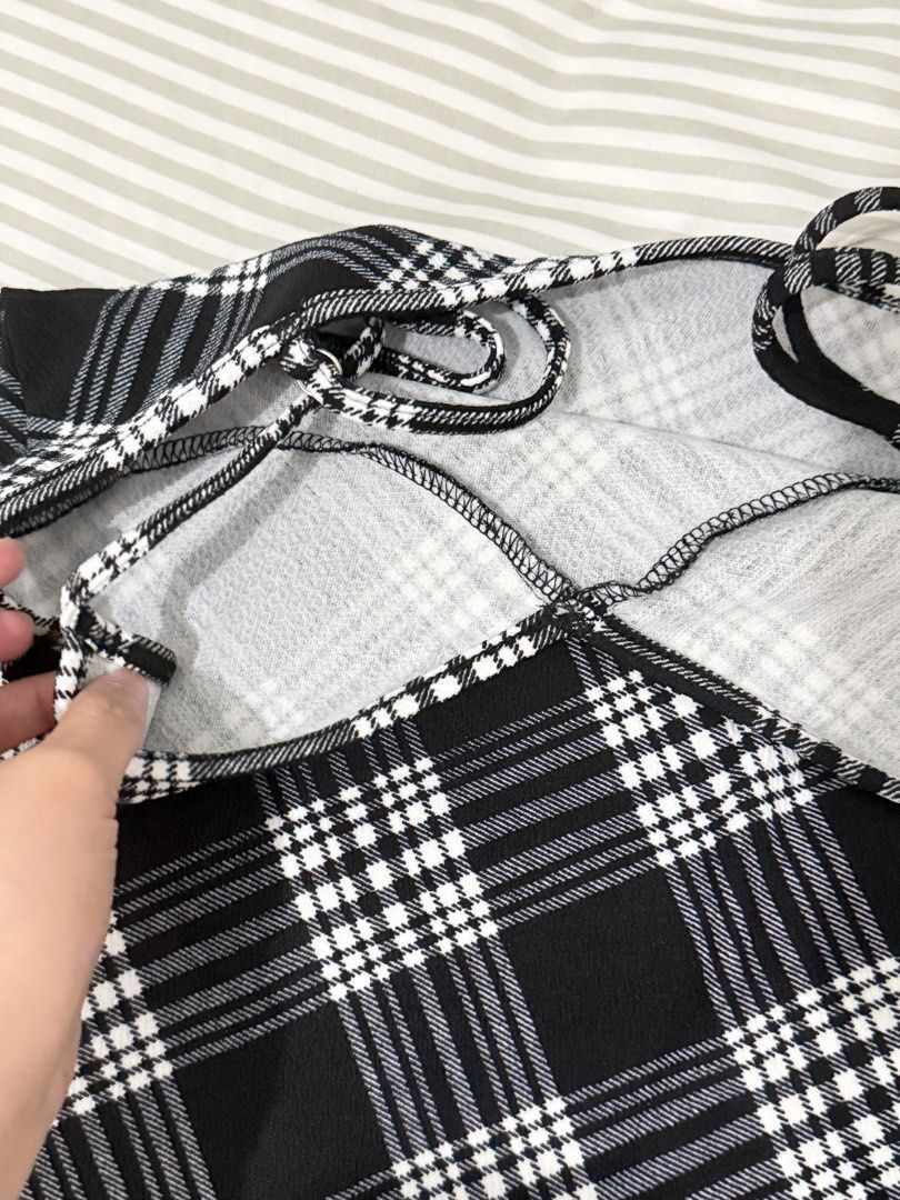 Black White Plaid Spaghetti Strap Midi Dress (Category: Dresses) located in Pasig City. Submitted by howdykoko (Listing ID 1444845103, Image 3). Description: Similar to the shein screenshot. Size small.