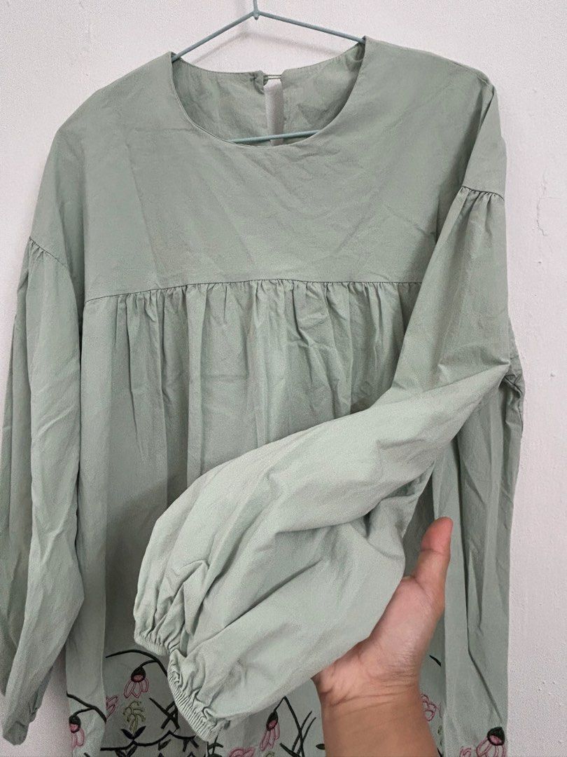 Embroidery Blouse (Category: Tops) located in Kota Tinggi. Submitted by aleeia_08 (Listing ID 1444701708, Image 3). Description: Floral Blouse with little embroidery at sleeves Colour Sage Green Material cotton.