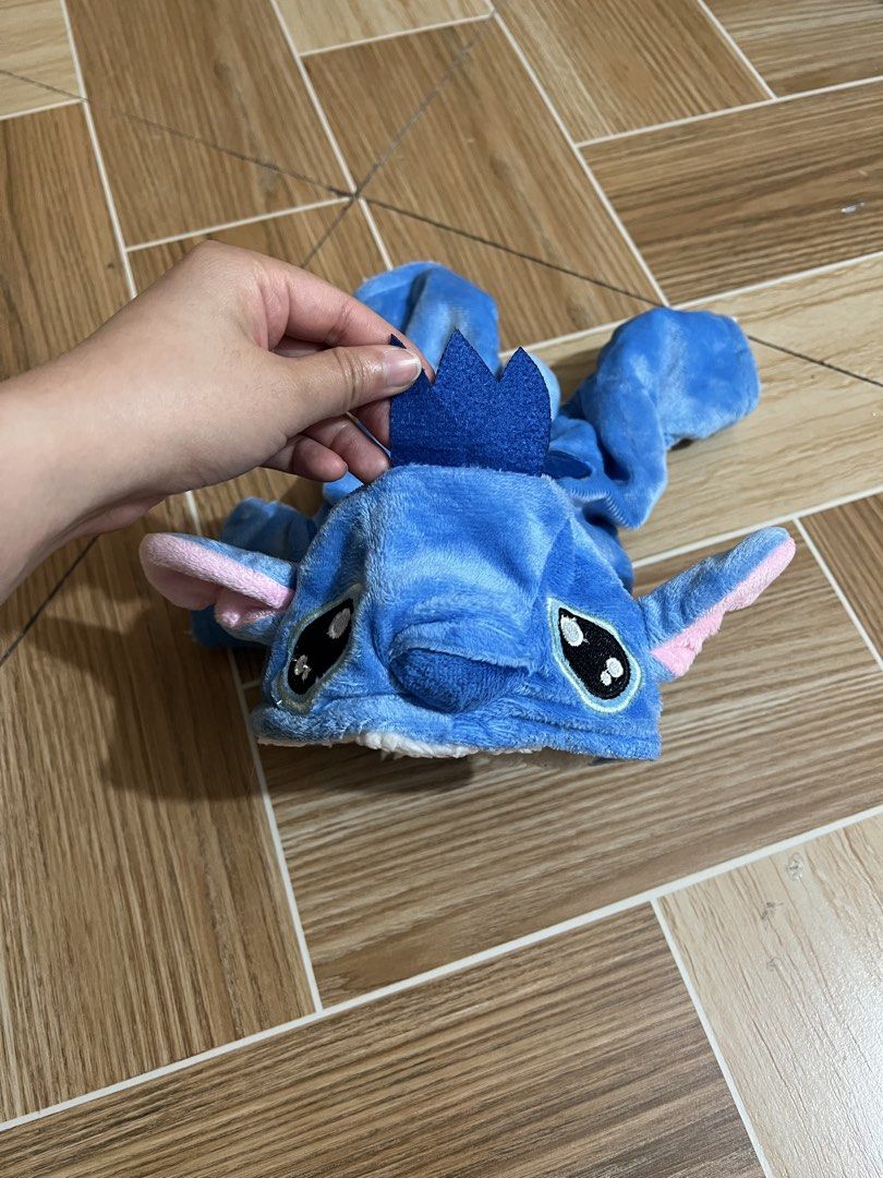 CAT/DOG clothes (Category: Homes & Other Pet Accessories) located in Baguio. Submitted by izzy1234123 (Listing ID 1444763641, Image 3). Description: -XS - Adorable Stitch costume for your pet - Made from soft, plush material with warm fleece lining - Features a hood with Stitch's face and ears - Includes a cute little crown detail - Easy snap closure for quick dressing - Perfect for keeping pets warm, stylish, and photo-ready.