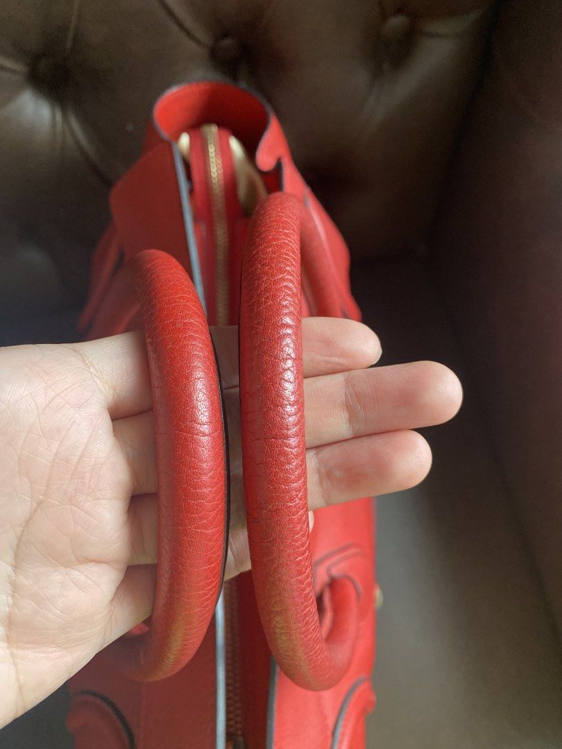 Celine Red Leather Luggage Tote Bag (Category: Luxury Bags & Wallets) located in Pasig City. Submitted by authentic_shopaholic_manila (Listing ID 1444708973, Image 3). Description: - Classic Celine Mini red leather tote - Iconic luggage design - Features a zippered front pocket - Comfortable top handles - Spacious interior for essentials - Timeless piece for any wardrobe - Ideal for daily use or special occasions Like us on FB: AUTHENTIC SHOPAHOL