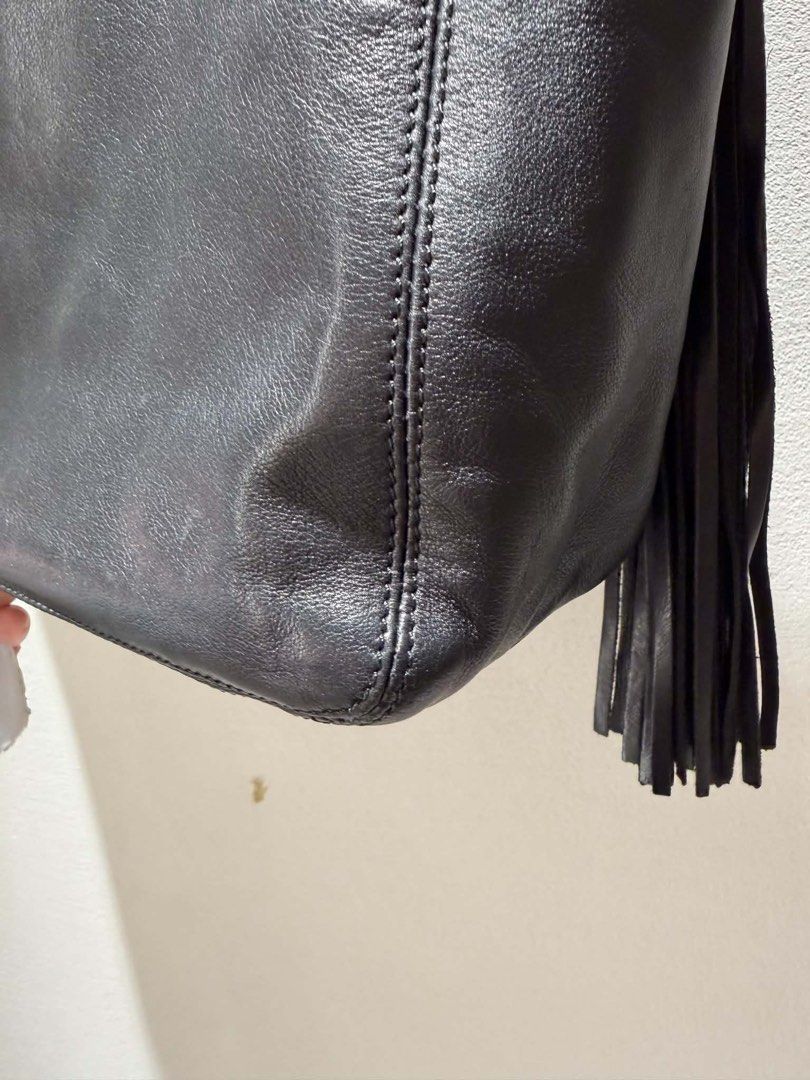 Chanel (Category: Luxury Bags & Wallets) located in Navotas City. Submitted by minaly_ (Listing ID 1444765310, Image 3). Description: - Chanel CC Tassel Tote crafted from black lambskin leather and features a large stitched CC logo - 100% guaranteed authentic - With authenticity card - With holo sticker - Negotiable Price.