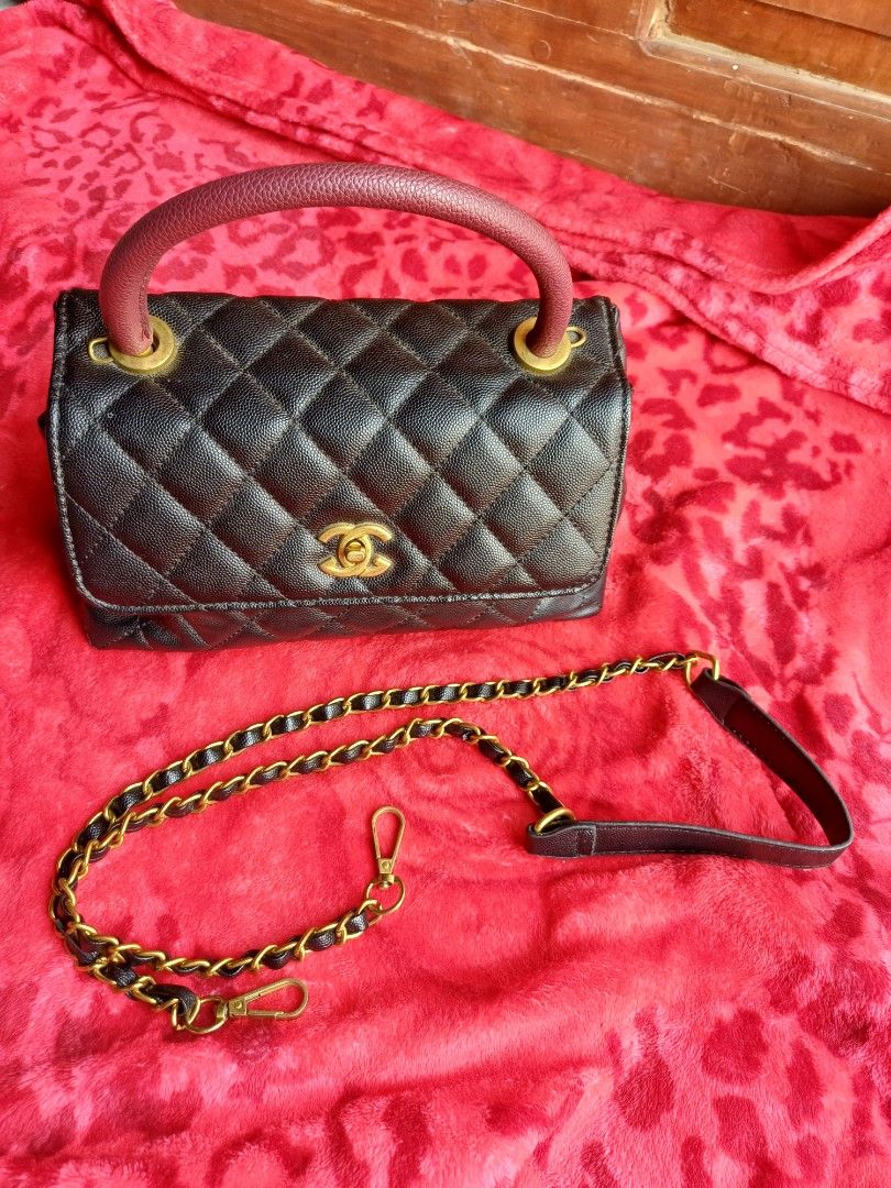 Chanel Quilted Flap Bag with Chain Strap (Category: Luxury Bags & Wallets) located in Dagupan City. Submitted by ma.potchii0287 (Listing ID 1444725503, Image 1). Description: - Black quilted caviar leather - Gold hardware and chain strap - Top handle included - Detachable shoulder strap for versatility - Fits long wallet - 2 zipper pocket and 1 open compartment inside. 1 open pocket outside .