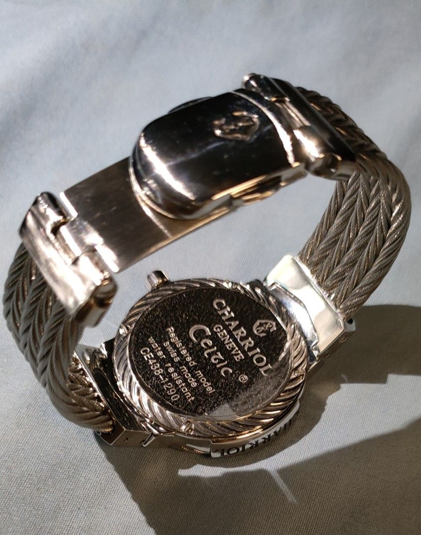 Charriol Geneve Celtic Watch (Category: Luxury Watches) located in Quezon City. Submitted by nobody241625 (Listing ID 1444850820, Image 2). Description: -REPRICED - Authentic Charriol Geneve Celtic watch - Unisex 38mm. Bracelet size is small. Elegant white dial with Roman numerals - Durable stainless steel bracelet - Water resistant for everyday peace of mind - Model number: CE438-1290 -Watch only no other inclusions -Guaranteed in mint condition