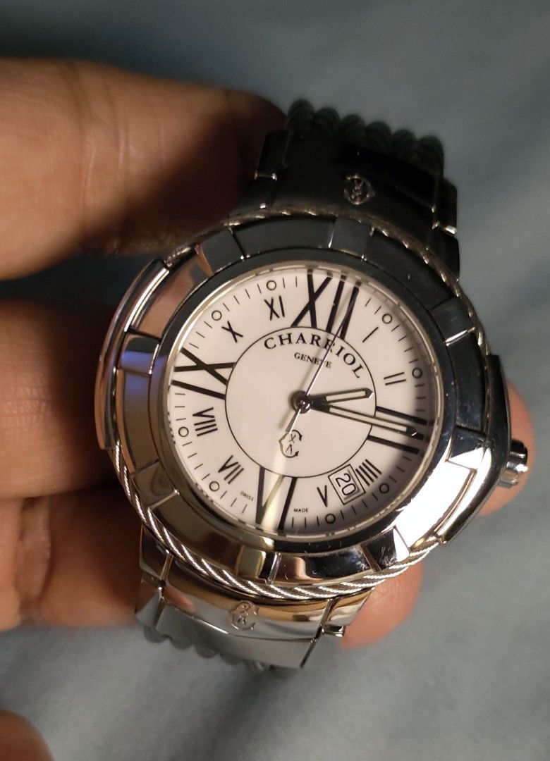 Charriol Geneve Celtic Watch (Category: Luxury Watches) located in Quezon City. Submitted by nobody241625 (Listing ID 1444850820, Image 1). Description: -REPRICED - Authentic Charriol Geneve Celtic watch - Unisex 38mm. Bracelet size is small. Elegant white dial with Roman numerals - Durable stainless steel bracelet - Water resistant for everyday peace of mind - Model number: CE438-1290 -Watch only no other inclusions -Guaranteed in mint condition