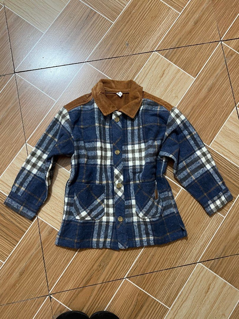 Children's Plaid Jacket with Corduroy Collar (Category: Coats, Jackets and Outerwear) located in Baguio. Submitted by izzy1234123 (Listing ID 1444764949, Image 1). Description: -for babies - Cute blue and white plaid jacket by Cuby - Size 100 - Features a stylish brown corduroy collar - Includes matching brown corduroy elbow patches - Easy button-up front - Two chest pockets - Warm and stylish for cooler weather - Great for everyday wear.