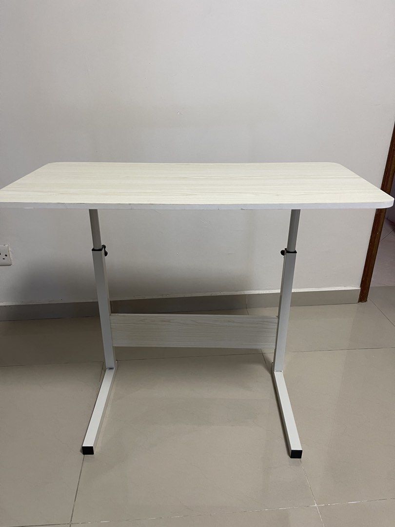 Computer table and Side table (Category: Tables & Sets) located in Singapore. Submitted by reignsfinn (Listing ID 1444758157, Image 1). Description: Bedside or Computer table, portable with adjustable height. .