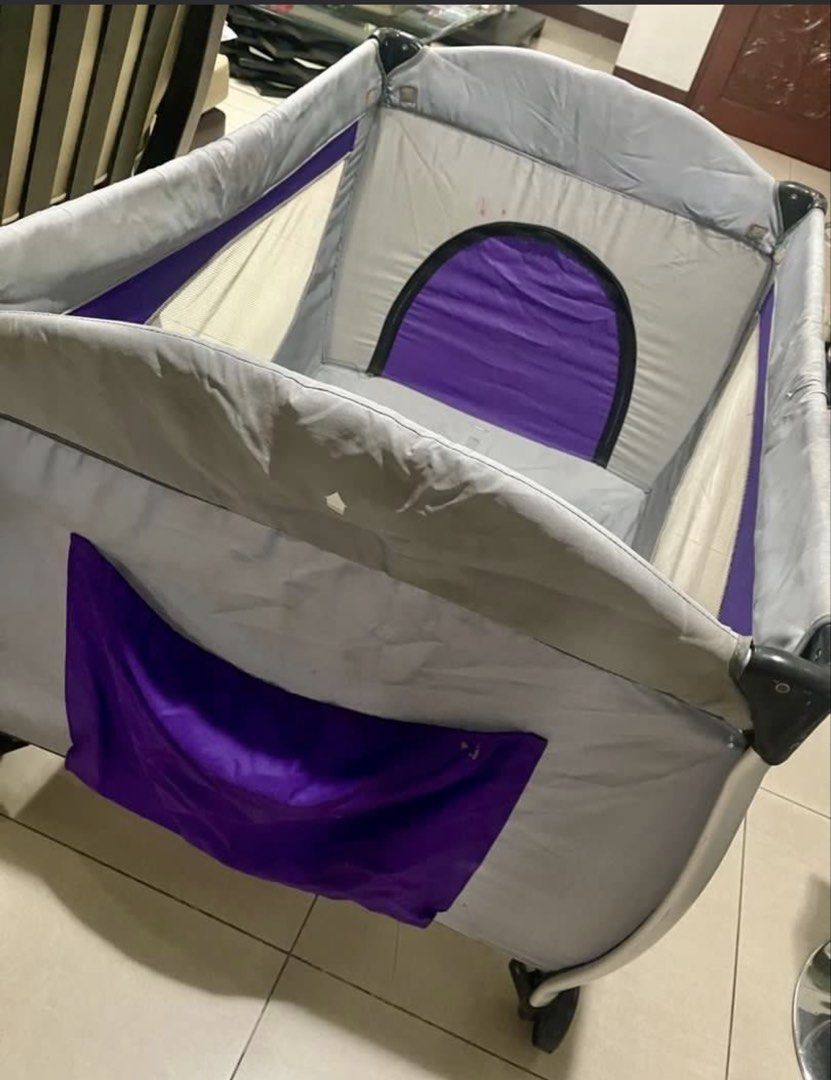 Cuddlebug Baby Playpen with Mattress and Mobile (Category: Cots & Cribs) located in Quezon City. Submitted by sophies.closet (Listing ID 1444735143, Image 3). Description: - Portable baby playpen, bought at Youji@Me for Php8k+ - Includes comfortable mattress - Cute teddy bear mobile for entertainment - Mesh window for good ventilation - Easy to move with wheels - Folds compactly for storage - Ensures baby's safety and provides a fun space.