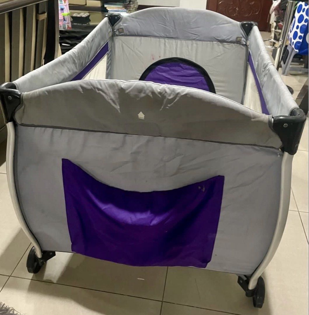 Cuddlebug Baby Playpen with Mattress and Mobile (Category: Cots & Cribs) located in Quezon City. Submitted by sophies.closet (Listing ID 1444735143, Image 2). Description: - Portable baby playpen, bought at Youji@Me for Php8k+ - Includes comfortable mattress - Cute teddy bear mobile for entertainment - Mesh window for good ventilation - Easy to move with wheels - Folds compactly for storage - Ensures baby's safety and provides a fun space.