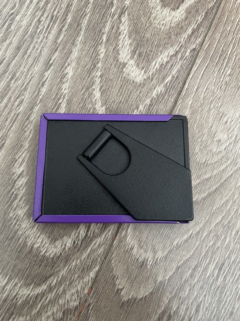 Cute Purple Mini Photo Frame (Category: Frames & Pictures) located in Muntinlupa City. Submitted by ad13zstvff (Listing ID 1444756811, Image 2). Description: - Adorable mini photo frame - Vibrant purple color - Features charming leaf accents on corners - Includes a stand for easy display - Ideal for small photos and desk decor.