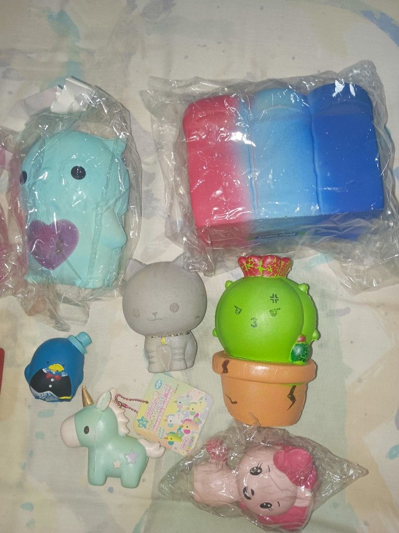 Cute Scented Squishy Toys Bundle (includes licensed and unlicensed squishies) (Category: Kids Toys) located in San Juan City. Submitted by rctdeclutter_ (Listing ID 1444717730, Image 3). Description: - Adorable Squishy Toy Bundle! - Includes: Soft n Slo Pink Cat and Blue Owl, French Fries, Luna Tabby Grey Cat, Koi Cactus, Amuse Yumekira Unicorn, My little pony Pink Unicorn, Mini tuxedo sam, and Blue red jumbo bread - Great for stress relief - Man