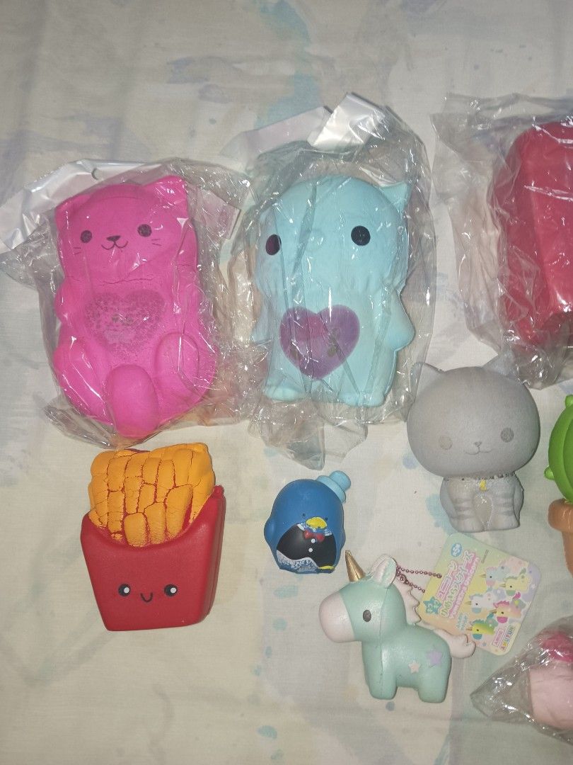 Cute Scented Squishy Toys Bundle (includes licensed and unlicensed squishies) (Category: Kids Toys) located in San Juan City. Submitted by rctdeclutter_ (Listing ID 1444717730, Image 2). Description: - Adorable Squishy Toy Bundle! - Includes: Soft n Slo Pink Cat and Blue Owl, French Fries, Luna Tabby Grey Cat, Koi Cactus, Amuse Yumekira Unicorn, My little pony Pink Unicorn, Mini tuxedo sam, and Blue red jumbo bread - Great for stress relief - Man