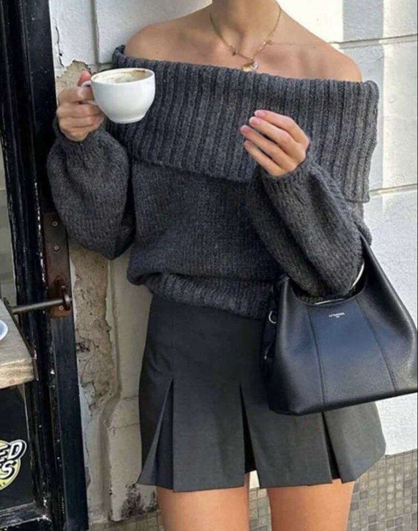 Dark Grey Off-Shoulder Knit Sweater (Category: Sets or Coordinates) located in Quezon City. Submitted by infinitaeee (Listing ID 1444804909, Image 1). Description: USED ONCE - Cozy dark grey knit sweater - Off-shoulder neckline - Ribbed texture.