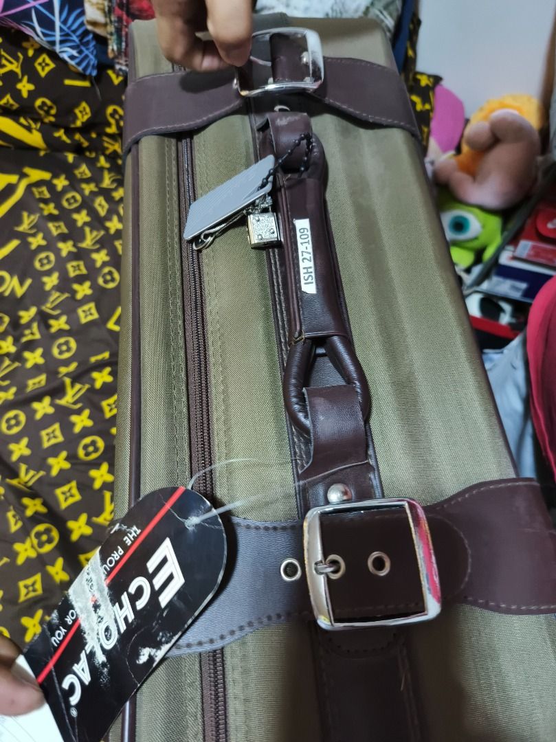 Echolac Vintage Suitcase Luggage (Category: Luggage) located in San Leonardo. Submitted by burgossanleonardo.12345 (Listing ID 1444845693, Image 3). Description: - Olive green Echolac suitcase - Brown trim and handles - Built-in wheels for easy mobility - Comes with a small padlock and key - Interior straps to keep belongings secure - Ideal for travel.