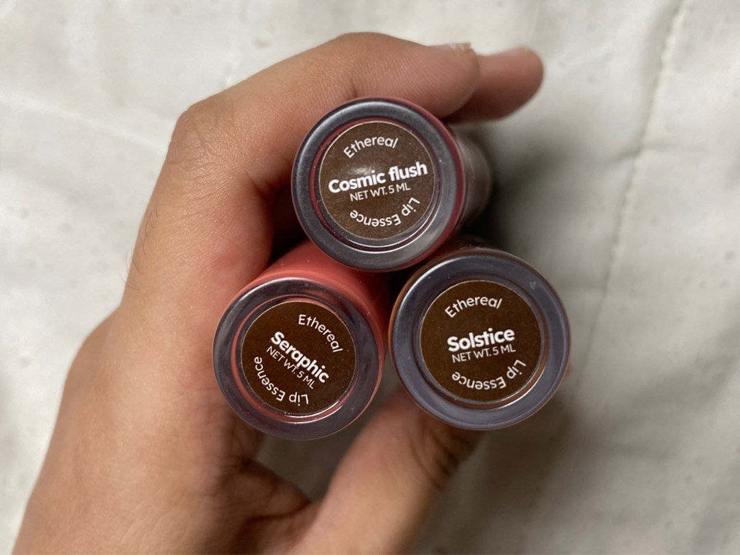 Ethereal Lip Essence Gloss - Seraphic, Solstice, Cosmic Flush (Category: Makeup) located in Abucay. Submitted by declutterwyana (Listing ID 1444778333, Image 2). Description: - Ethereal lip essence glosses in shades Seraphic, Solstice, and Cosmic Flush. - ₱150 each. - Each tube contains 5ml of product. - Ideal for trying out various makeup looks..