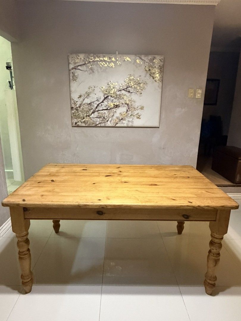 Farmhouse Solid Wood Dining Table (Category: Tables & Sets) located in Las Pinas. Submitted by surplus.manila (Listing ID 1444741064, Image 1). Description: - Sturdy solid wood dining table - Features beautiful turned legs - Natural, warm wood grain - Very heavy - Good size for family meals and gatherings - Ready for a new home Length 60 inches Width 36 Height 30.5 .