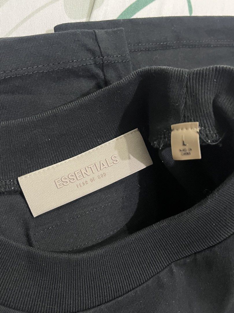 Fear of God Essentials T-Shirt Black Size L (Category: Tshirts & Polo Shirts ) located in Naga. Submitted by tresthrifts (Listing ID 1444690733, Image 3). Description: - Brand: Fear of God Essentials - Color: Black - Size: Large (L) - Material: 100% Cotton - Style: Simple, classic design - Perfect for: Everyday wear - Condition: Please check photos for details Size on Tag: L Dimes (inches): L - 29.5 W - 21 Sleeves - 7.5 Mine: 600 + sf Color Rate: