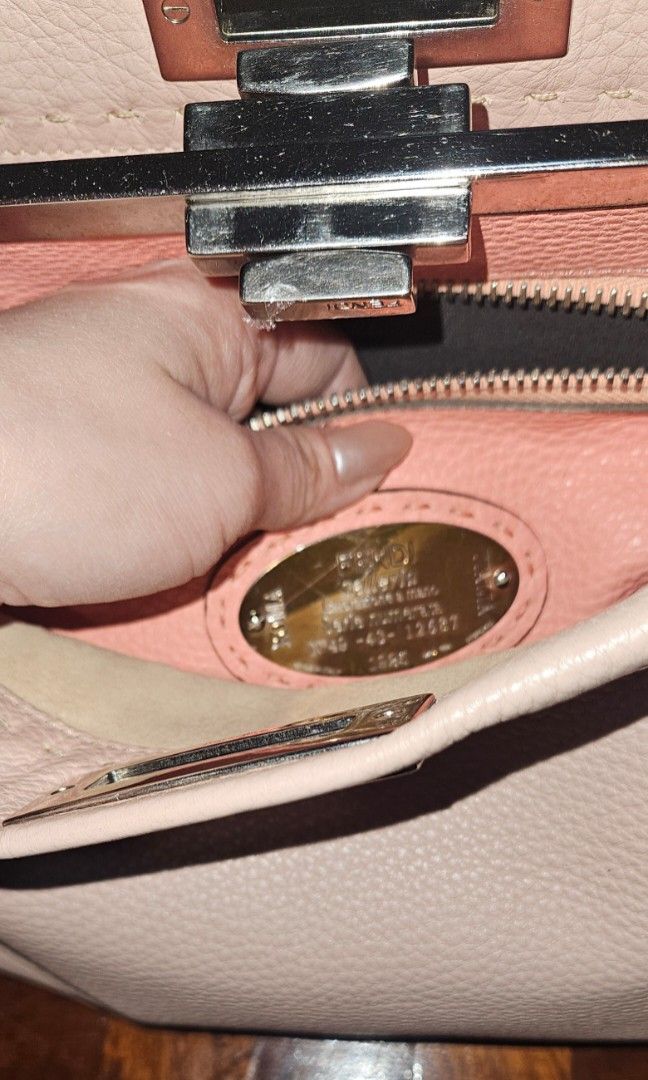 FENDI PEEKABOO (Category: Luxury Bags & Wallets) located in Quezon City. Submitted by nadine_miel (Listing ID 1444815586, Image 3). Description: Medium Fendi Peekaboo Nude pink w/ adjustble strap ,dustbag and entrupy certificate 40k.