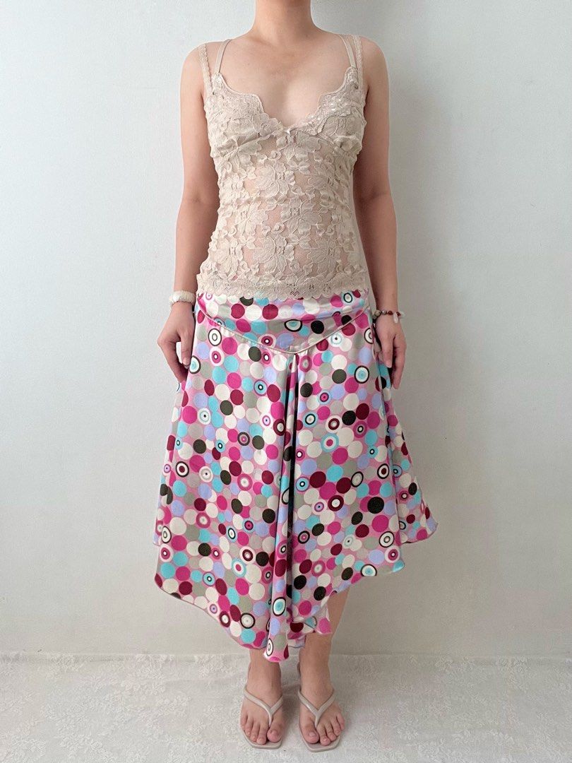 Funky polka multicolor asymmetrical satin skirt (Category: Skirts) located in Dagupan City. Submitted by rarus (Listing ID 1444857518, Image 1). Description: Funky polka multicolor asymmetrical satin skirt • Light & soft satin material • Zipper as closure • No lining Waist 29-30” Hips up to 42” Length 27”.