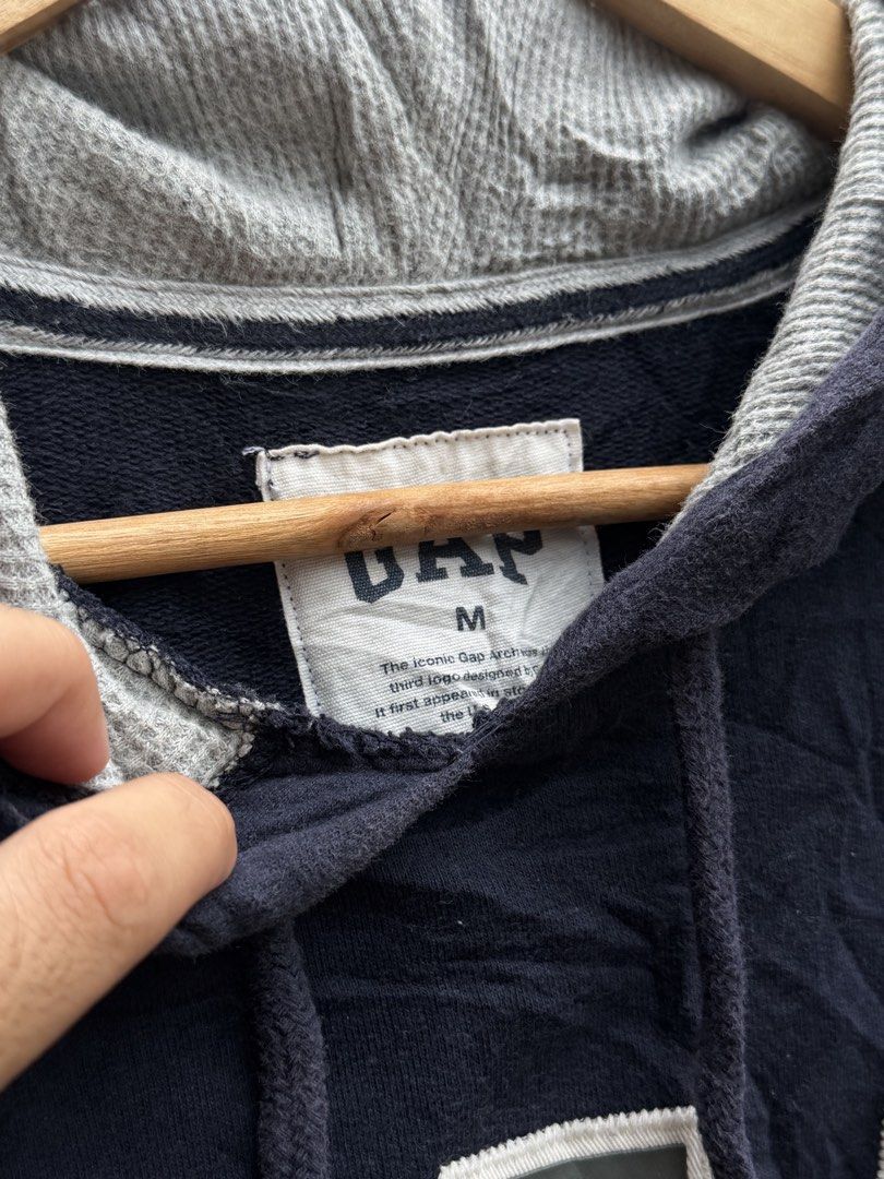 GAP Navy Blue Hoodie Size M (Category: Hoodies) located in Bacolod City. Submitted by Ms_OnlineBoutiqe (Listing ID 1444719369, Image 3). Description: - Classic navy blue GAP hoodie -width 20 and a half -length 25 - Features iconic GAP logo across the chest - Made from comfortable material - Perfect for casual wear - Size: Medium - Please check photos for detailed condition.