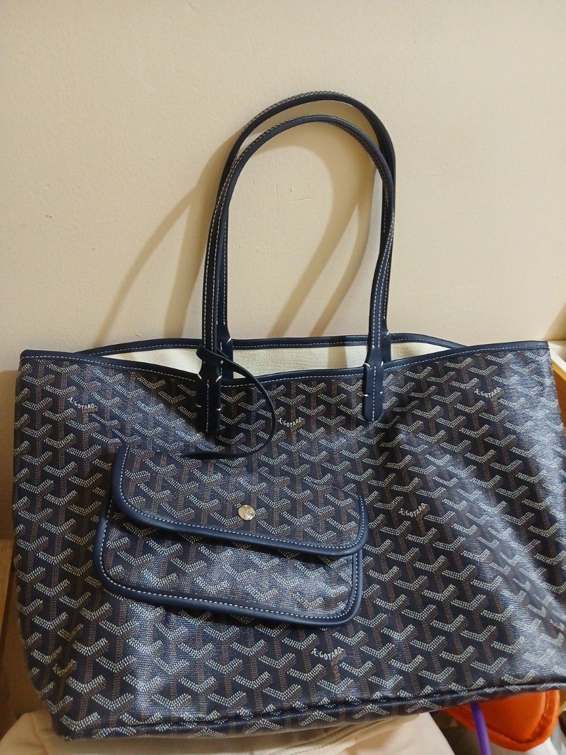 Goyard St. Louis Tote Bag (Category: Luxury Bags & Wallets) located in Las Pinas. Submitted by cheechay09 (Listing ID 1444839842, Image 2). Description: - Classic Goyard tote bag - Dark blue with signature all-over print - Genuine leather handles and trim - Includes a small detachable pouch - Spacious interior, ideal for everyday or travel - A timeless and versatile accessory.