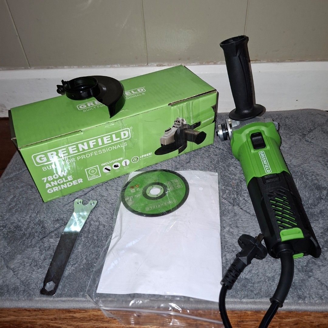 Greenfield 780W Angle Grinder with Accessories (Category: Construction Tools & Equipment) located in Pasig City. Submitted by fast-ship (Listing ID 1444740710, Image 1). Description: - Greenfield 780W Angle Grinder - Comes with original box - Includes guard, disc, and wrench - Tested and confirmed working - Ready for your projects.