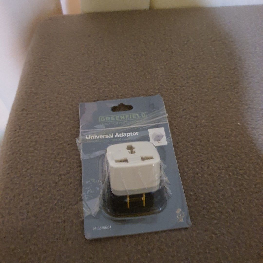 Greenfield Universal Travel Adapter (Category: Cables & Adaptors) located in Pasig City. Submitted by fast-ship (Listing ID 1444741361, Image 2). Description: - Greenfield Universal Travel Adapter - Available in White and Black - Allows international device compatibility - Compact and portable design - Ideal for travel abroad - Brand new, still in original packaging.
