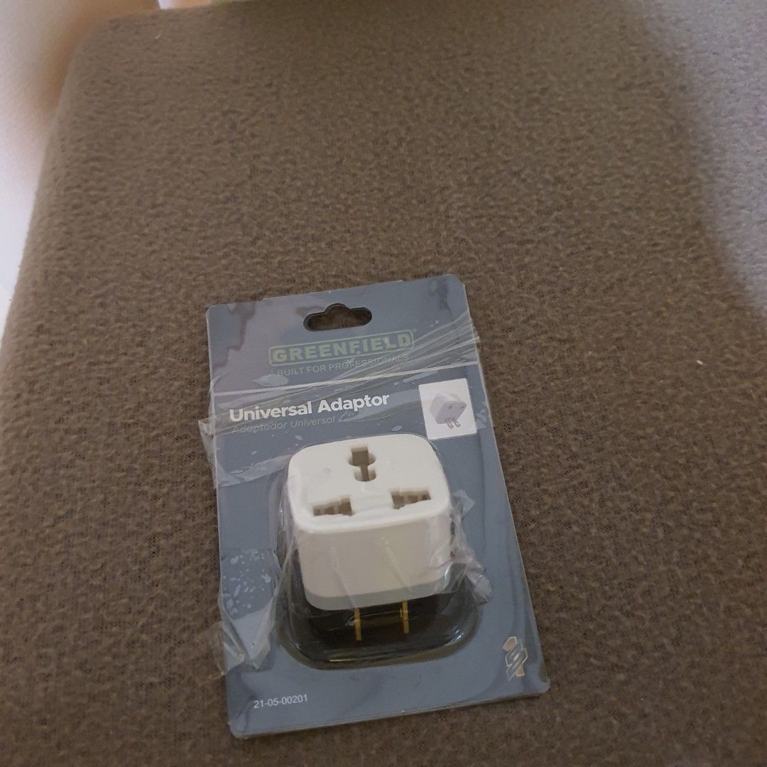 Greenfield Universal Travel Adapter (Category: Cables & Adaptors) located in Pasig City. Submitted by fast-ship (Listing ID 1444741361, Image 3). Description: - Greenfield Universal Travel Adapter - Available in White and Black - Allows international device compatibility - Compact and portable design - Ideal for travel abroad - Brand new, still in original packaging.