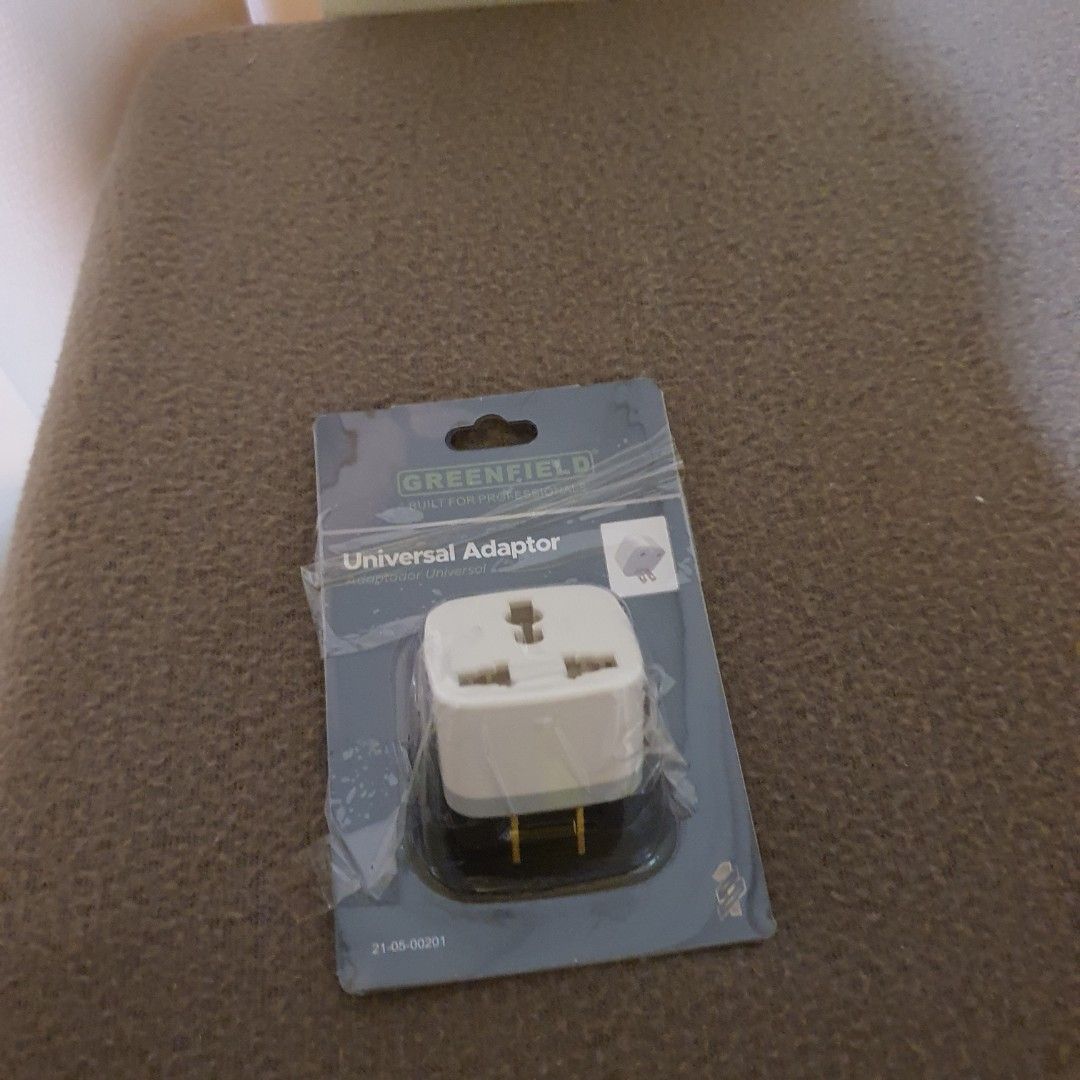 Greenfield Universal Travel Adapter (Category: Cables & Adaptors) located in Pasig City. Submitted by fast-ship (Listing ID 1444741361, Image 1). Description: - Greenfield Universal Travel Adapter - Available in White and Black - Allows international device compatibility - Compact and portable design - Ideal for travel abroad - Brand new, still in original packaging.
