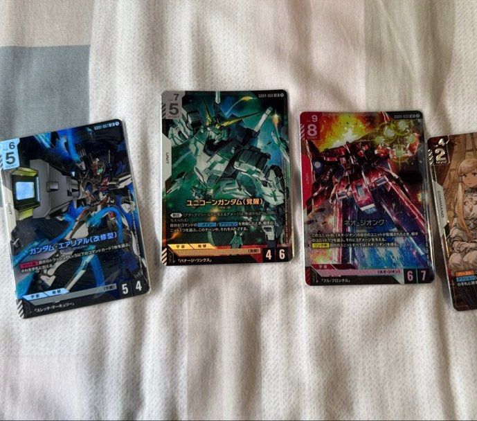 Gundam Card Game WTS GD01-067 / GD04-066 / GD04-033 / GD04-117 AA (Category: Raw Cards) located in Singapore. Submitted by joseph_cl (Listing ID 1443986823, Image 1). Description: Selling Cards (SGD): 1x GD04-117 (R+) = $45 [SOLD] 1x GD04-033 (LR) = $10 1x GD04-066 (LR) = $10 1x GD01-067 (LR) = $2.5 .