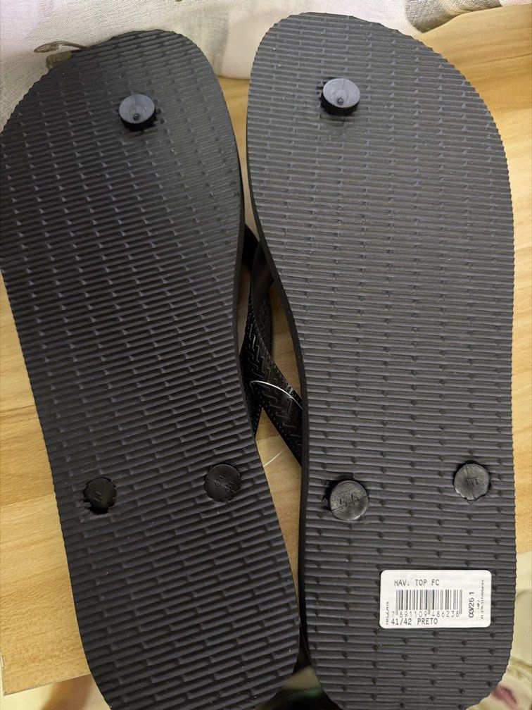 Havaianas Black Flip-Flops (Category: Flipflops and Slides) located in Singapore. Submitted by icedicemilo (Listing ID 1436141985, Image 3). Description: - Classic black Havaianas flip-flops (Size 41/42) - Ideal for everyday wear and beach trips - Comfortable and durable design - A timeless summer essential.