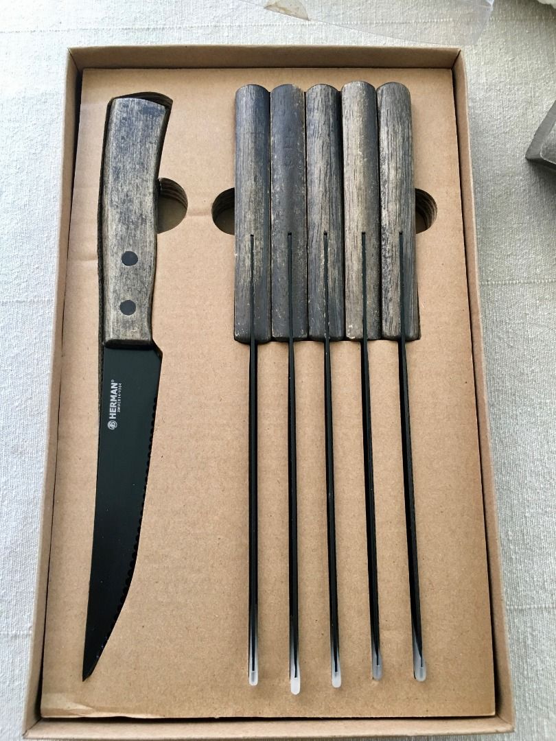 HERMAN Grillin & Chillin STEAK KNIFE Set-6 pcs. (Category: Knives & Chopping Boards) located in Calamba. Submitted by marjoh29436 (Listing ID 1444828826, Image 3). Description: - Set includes 6 steak knives - Knives feature non-stick coating and serrated blades for easy cutting. - Rustic wood-look handles add a stylish touch. - Ideal for BBQs, grilling, and outdoor cooking. - UNUSED, Comes in original packaging with tag (14.95 CHF), bought in Swi
