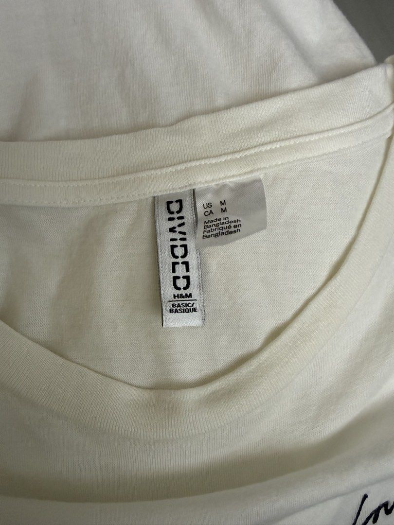 H&M Divided White 'Love' T-shirt (Category: Shirts) located in Los Banos. Submitted by jellybeeeans (Listing ID 1444734525, Image 3). Description: fits up to large body frame NWOT.