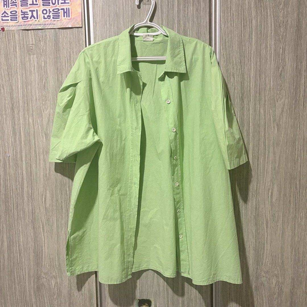 Light Green Short Sleeve Button-Up Shirt (Category: Shirts) located in Mandaluyong City. Submitted by valericeae (Listing ID 1444691888, Image 1). Description: - Light green short sleeve shirt - Classic button-up style with collar - Comfortable and casual - Ideal for everyday wear - Easy to pair with jeans or shorts.