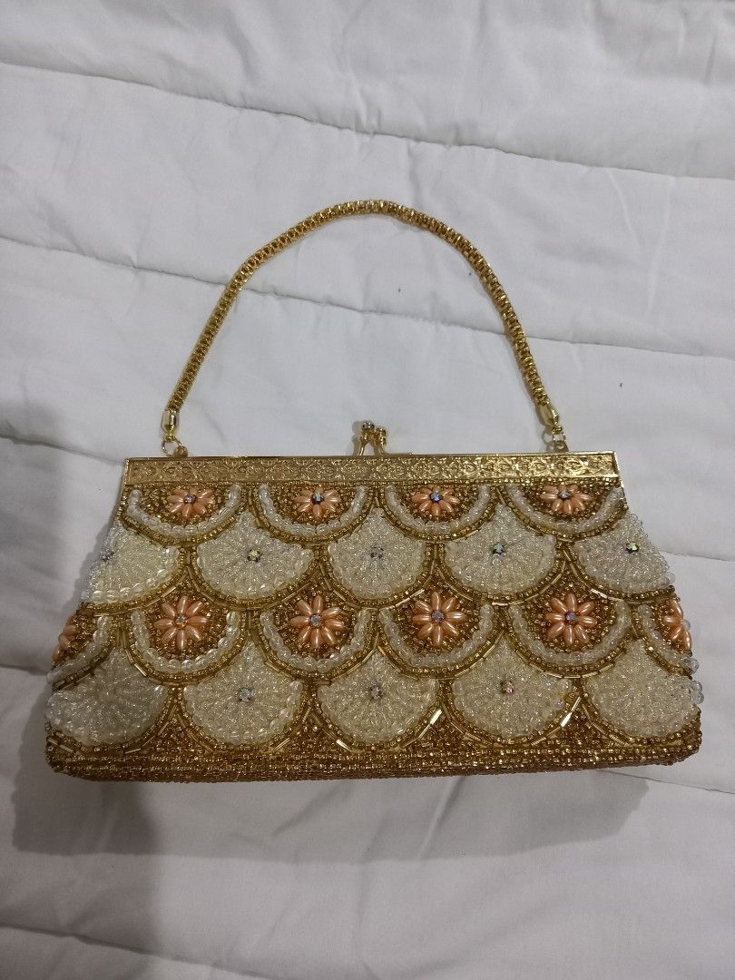 Like new beaded party bag Japan (Category: Clutches) located in Tuguegarao City. Submitted by zenphoenix-7ad615 (Listing ID 1444796653, Image 1). Description: with minimal dirt inside pretty in actual gold hardware 9 by 5 inches.