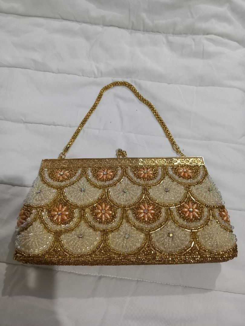 Like new beaded party bag Japan (Category: Clutches) located in Tuguegarao City. Submitted by zenphoenix-7ad615 (Listing ID 1444796653, Image 2). Description: with minimal dirt inside pretty in actual gold hardware 9 by 5 inches.