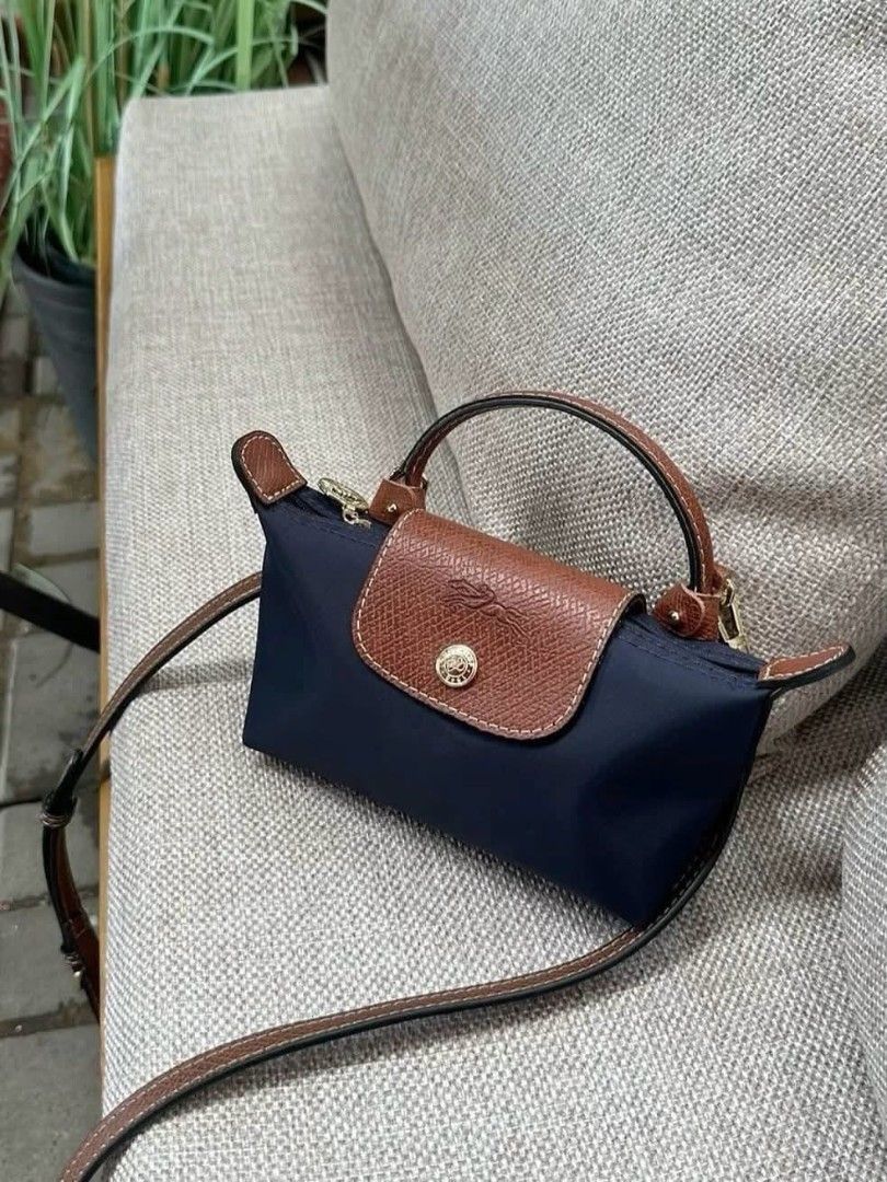 Long Champ Le Pliage Mini (Category: Luxury Bags & Wallets) located in Antipolo. Submitted by brigeshop01 (Listing ID 1437596627, Image 3). Description: bnew complete inclusions limited stocks available in Navy Blue💙 w/ strap.