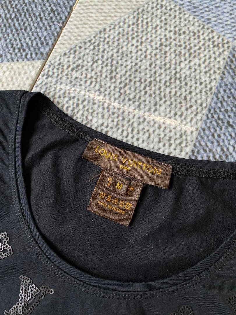 Louis Vuitton Black Monogram T-Shirt Size M (Category: Tshirts & Polo Shirts ) located in Bayambang. Submitted by lootsbyawen (Listing ID 1444710787, Image 2). Description: - Louis Vuitton T-Shirt - Iconic all-over LV monogram pattern - Color: Black - Material: Nylon and Lycra blend - Size: Medium (M) - Made in France - Perfect staple piece for any wardrobe - 16 W - 23 L .