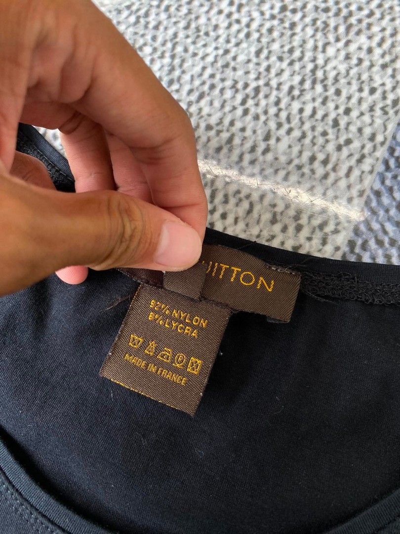 Louis Vuitton Black Monogram T-Shirt Size M (Category: Tshirts & Polo Shirts ) located in Bayambang. Submitted by lootsbyawen (Listing ID 1444710787, Image 3). Description: - Louis Vuitton T-Shirt - Iconic all-over LV monogram pattern - Color: Black - Material: Nylon and Lycra blend - Size: Medium (M) - Made in France - Perfect staple piece for any wardrobe - 16 W - 23 L .