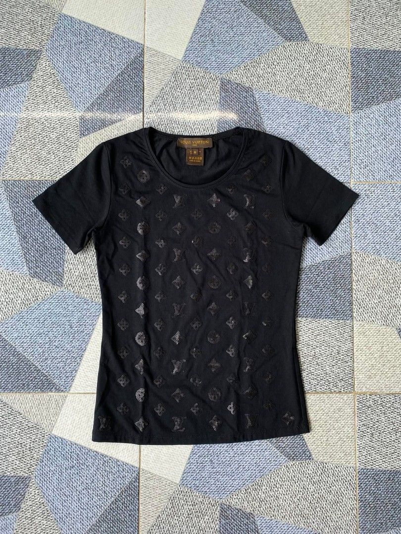 Louis Vuitton Black Monogram T-Shirt Size M (Category: Tshirts & Polo Shirts ) located in Bayambang. Submitted by lootsbyawen (Listing ID 1444710787, Image 1). Description: - Louis Vuitton T-Shirt - Iconic all-over LV monogram pattern - Color: Black - Material: Nylon and Lycra blend - Size: Medium (M) - Made in France - Perfect staple piece for any wardrobe - 16 W - 23 L .