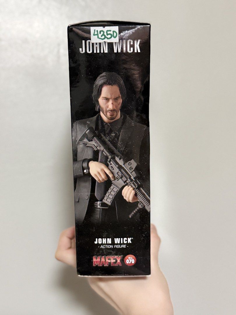 Mafex John Wick Action Figure 070 (Category: Figurines & Statues) located in Malabon City. Submitted by thylanapparel (Listing ID 1444737762, Image 3). Description: - Mafex John Wick Action Figure (Model 070) - Comes with multiple accessories, including guns - Includes alternate heads for different expressions - Perfect for fans of the John Wick movie franchise OG price: ₱4350 .
