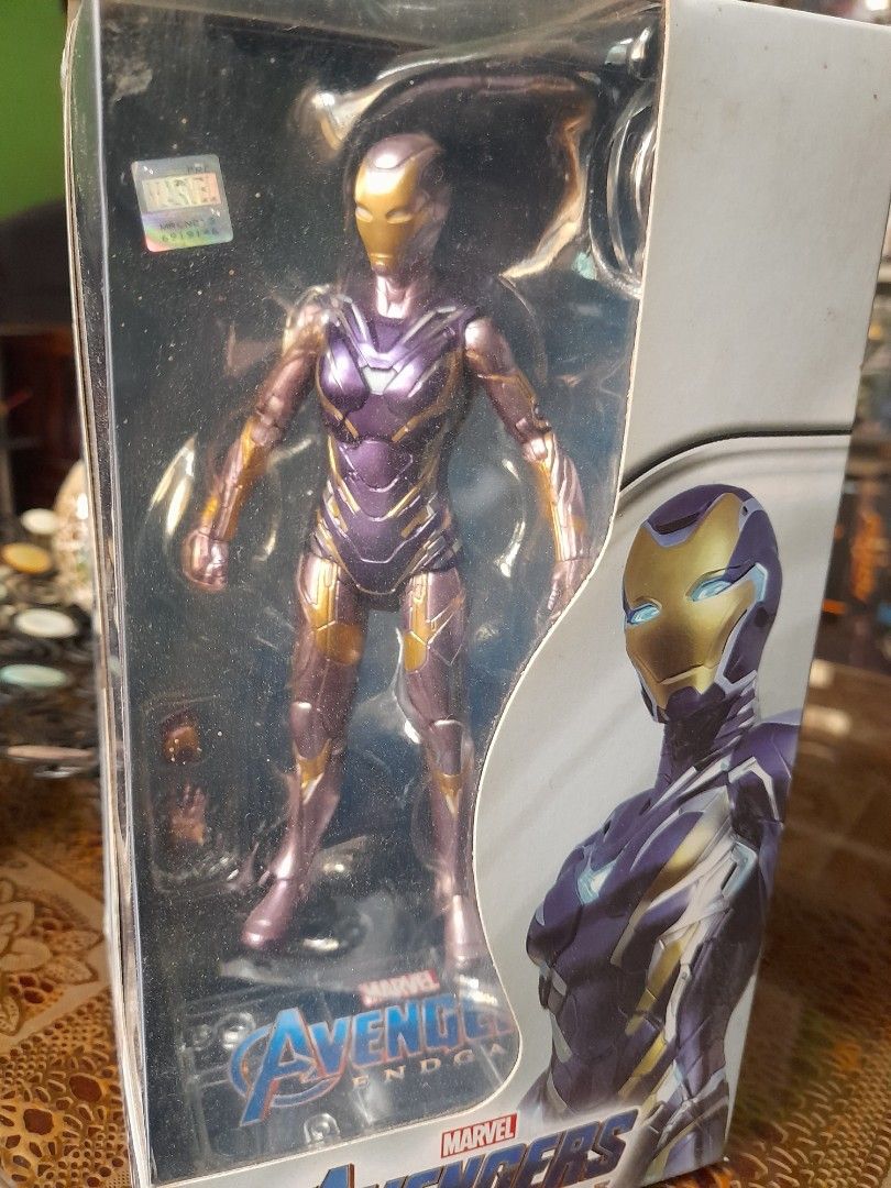 Marvel Avengers Endgame Iron Man Action Figure (Category: Figurines & Statues) located in Manila. Submitted by nix1219 (Listing ID 1444699511, Image 1). Description: - Iron Man action figure - From Avengers Endgame -like new in original packaging - Features a metallic purple and gold color scheme - Ideal for any Marvel fan's collection - Box showcases the character in action.