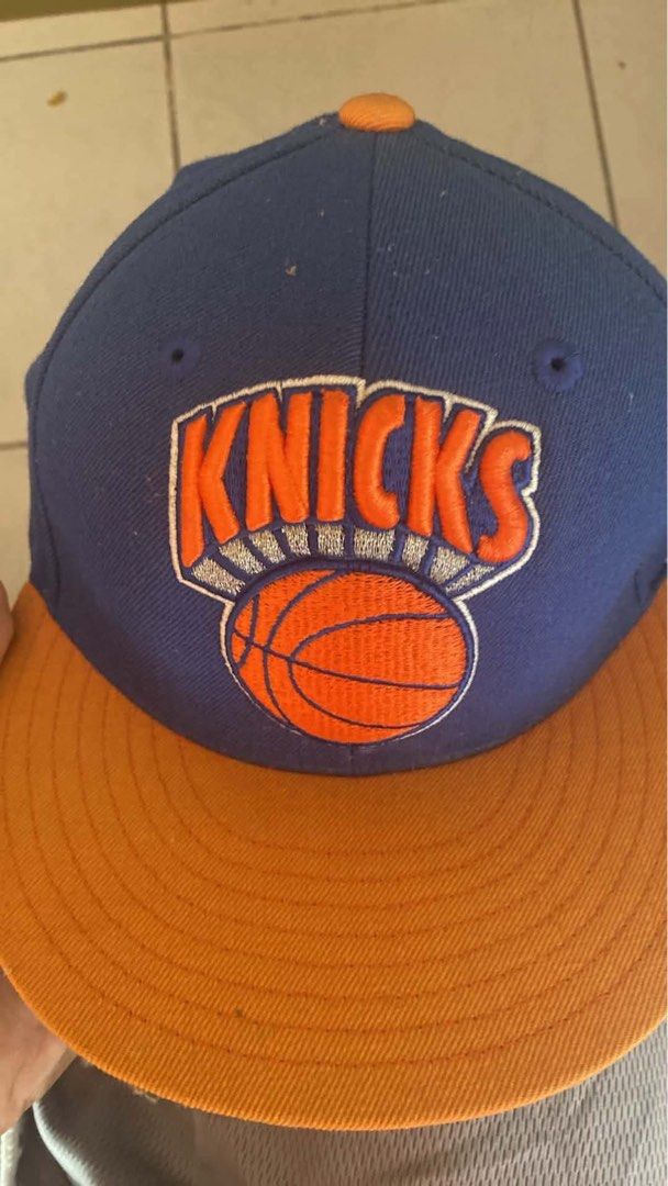 Mitchell & Ness New York Knicks Hardwood Classics Fitted Cap (Category: Caps & Hats) located in Santiago. Submitted by fajaaaad (Listing ID 1444857009, Image 1). Description: - Mitchell & Ness New York Knicks Cap - Hardwood Classics Edition - Fitted Size: 6 7/8 (55 cm) - Color: Blue with Orange Brim and Logo - Perfect for any Knicks fan! dm for more deets!.